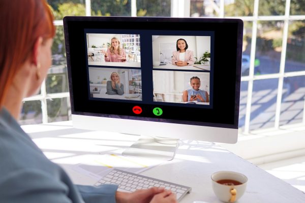 Business woman, video call and computer in a office for a discussion, zoom and webinar for a virtua