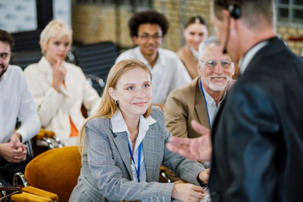 Cinematic image of a conference meeting.